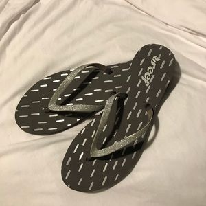 Reef silver flip flops